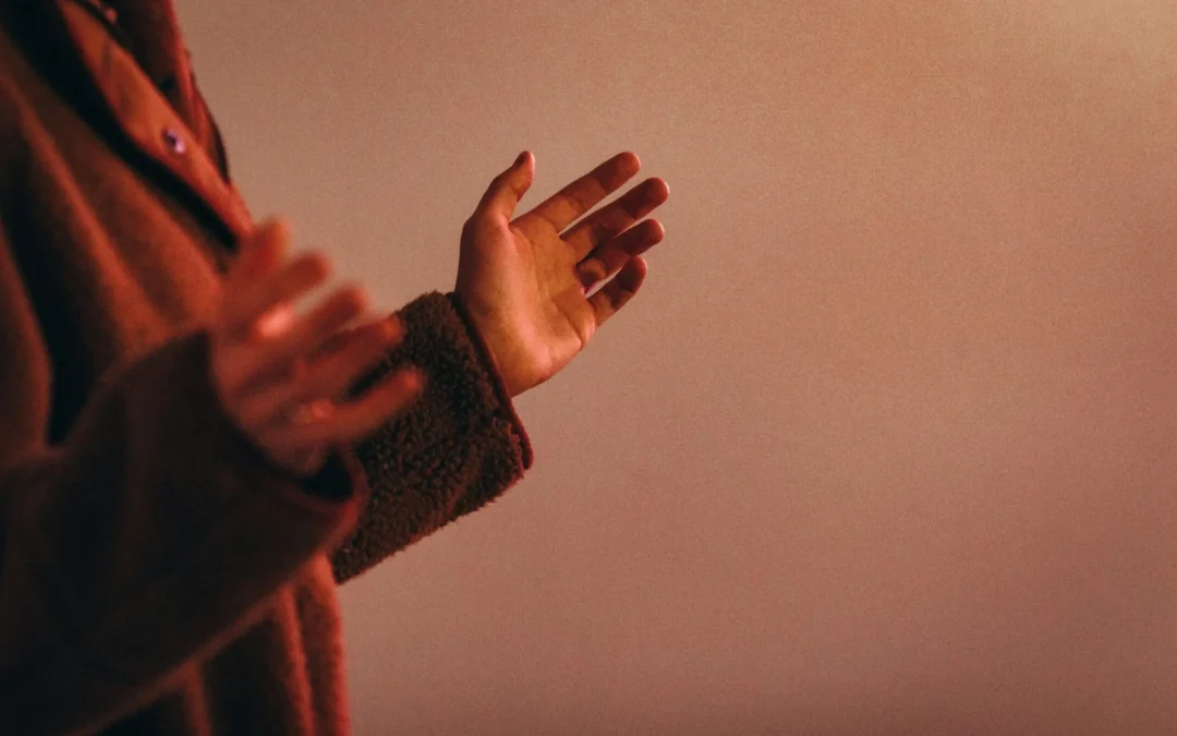 Hands raised in worship