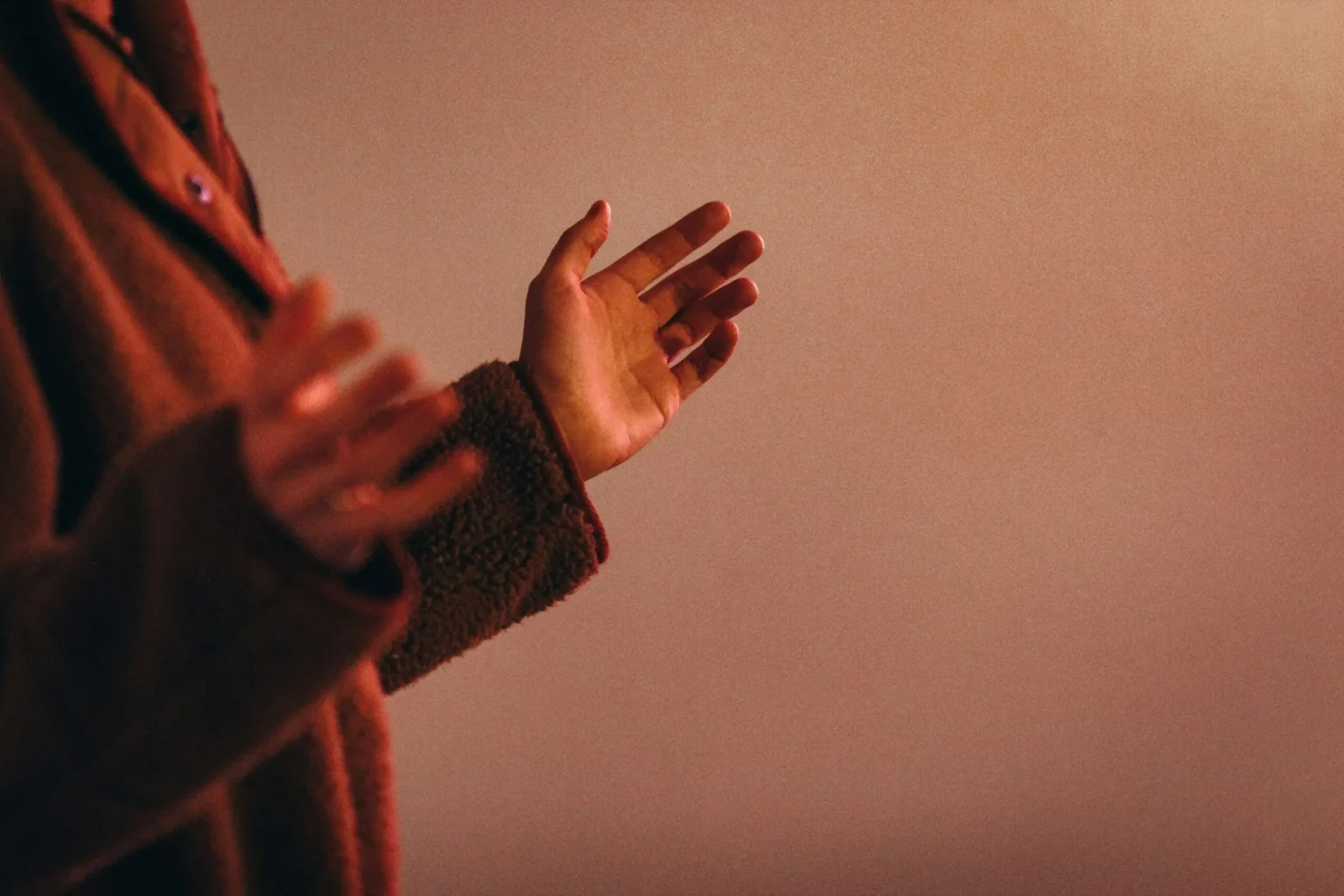 Hands raised in worship